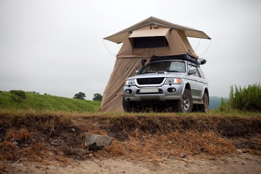 car with large roof tent - ideal for in-car camping