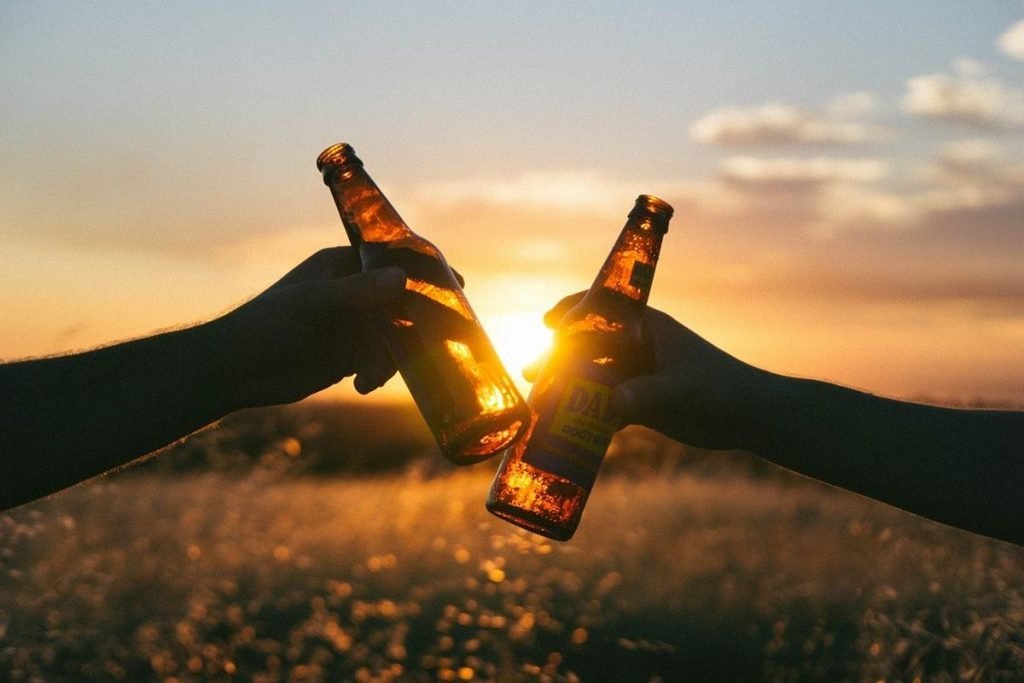 2 beer bottles clinking - make sure thay are cold with the best 12v portable camping fridges