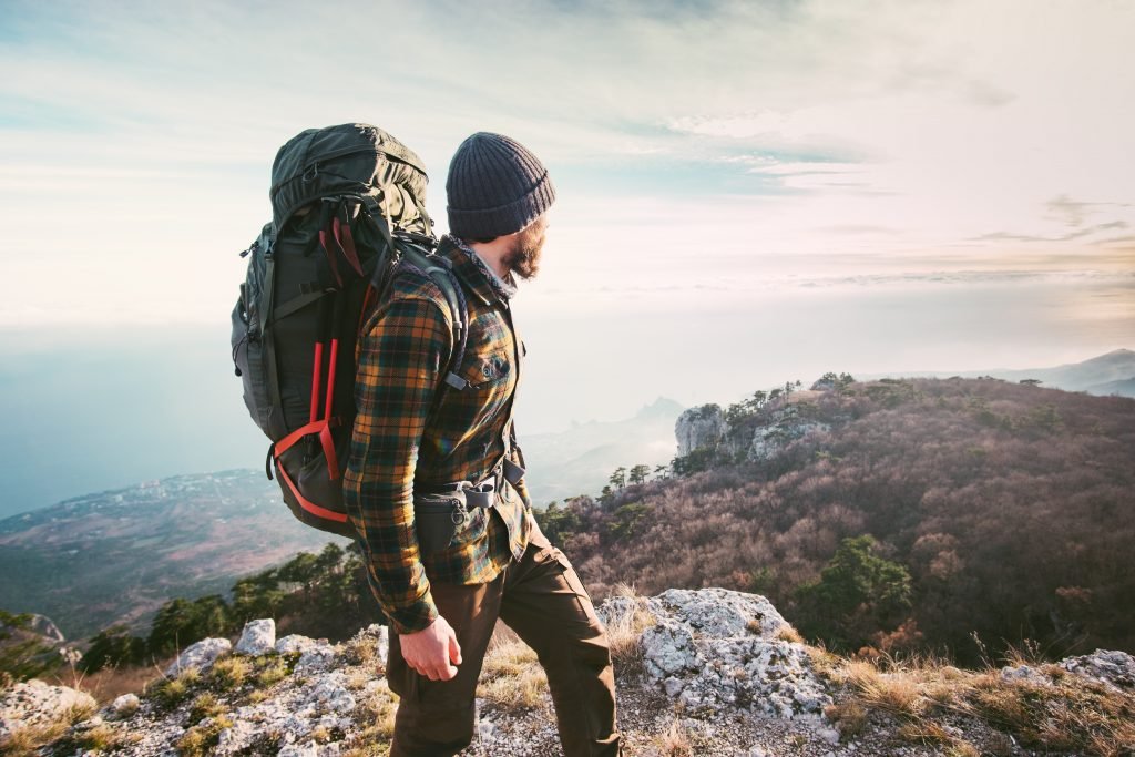 hiker looking over mountains